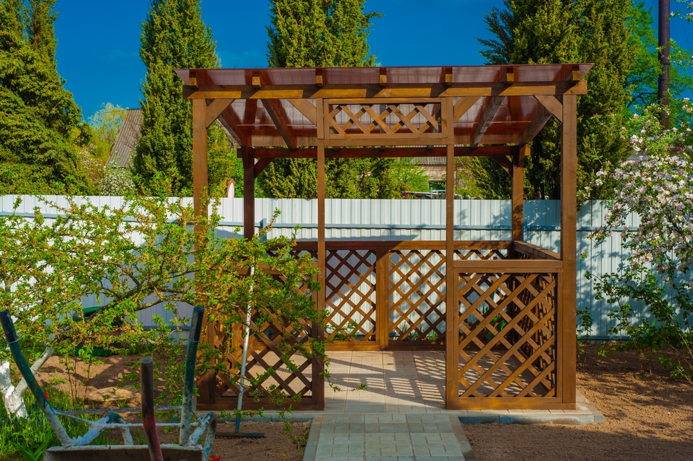 cozy wooden corner pergola