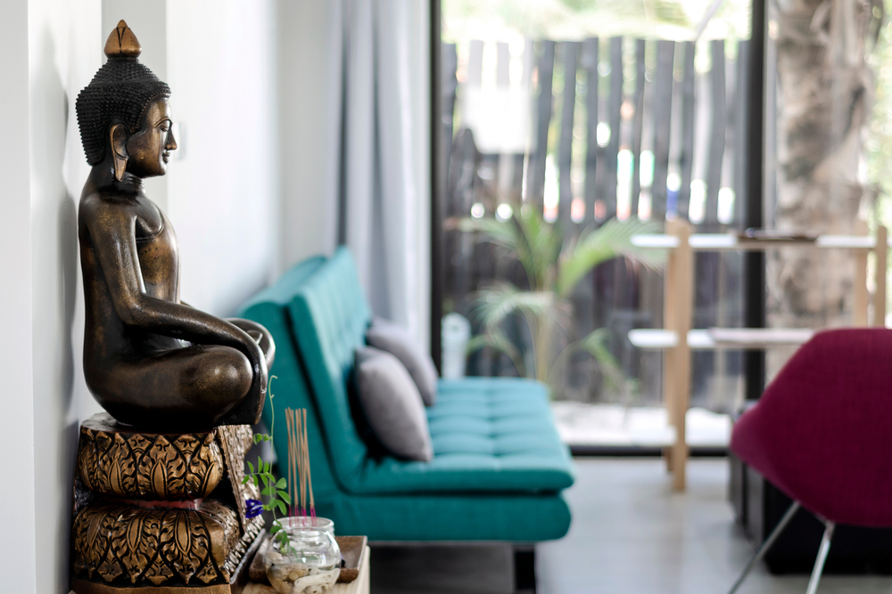 in the living room buddha statue